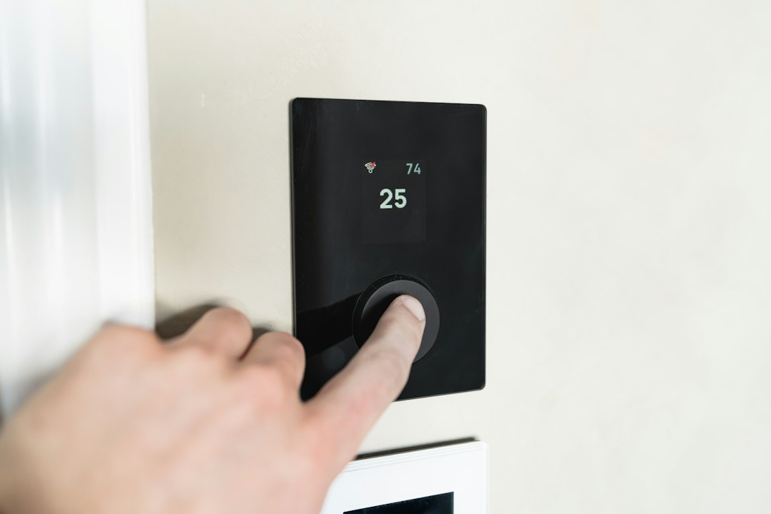 Modern smart home interior with integrated lighting, motorized shades, and a sleek control panel, representing advanced home automation.