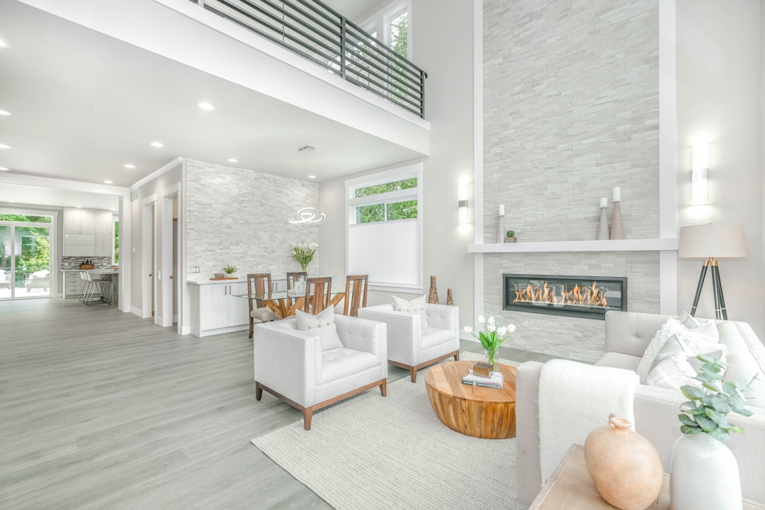 Modern living room with smart lighting and motorized shades adjusted to perfection